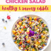 A picture of a cannabis rainbow chicken salad in a white bowl.